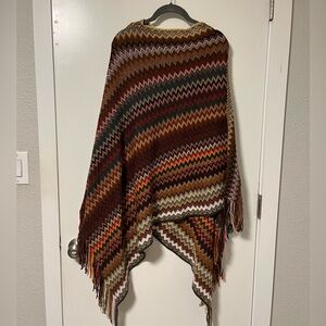 Chevron Patterned Asymmetrical Poncho With Fringe
